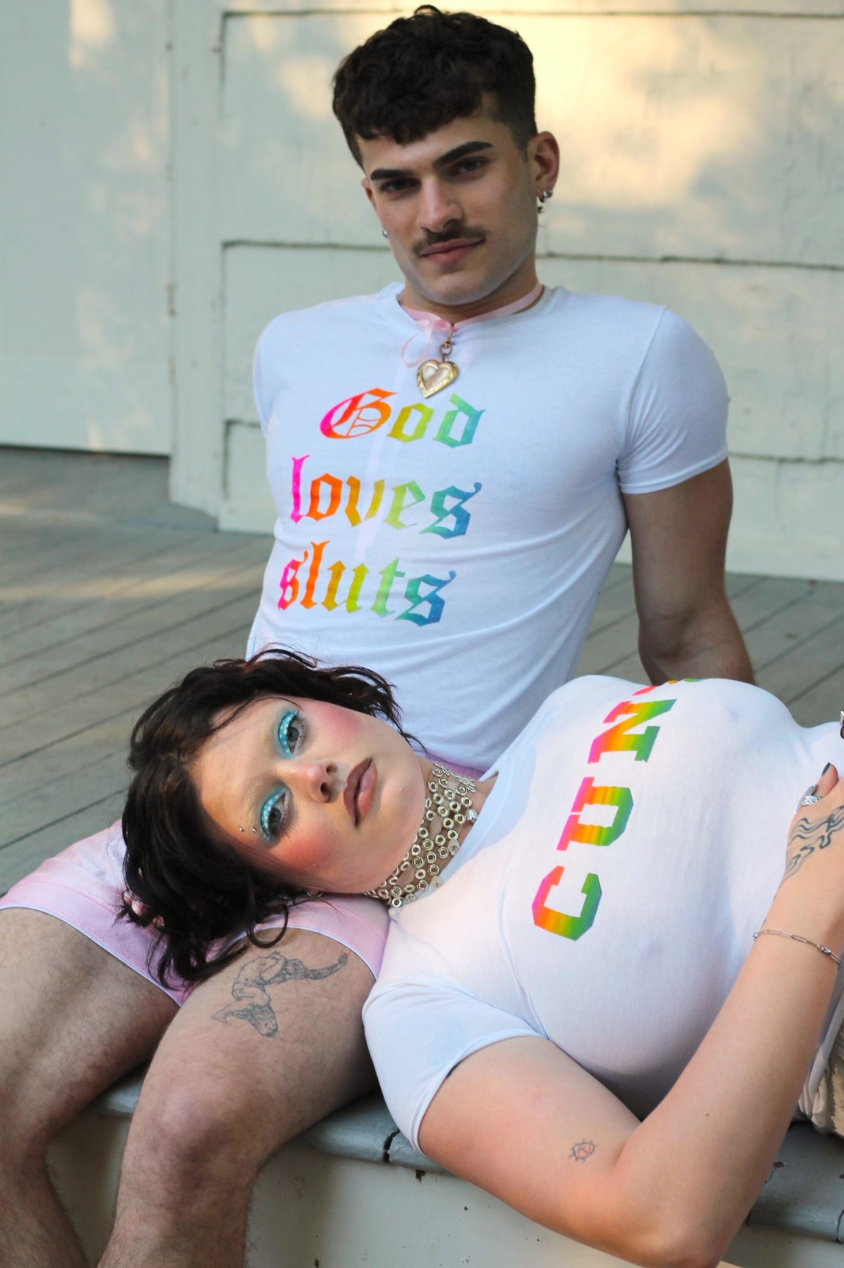 god loves sluts baby tee